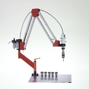 Pneumatic tapping machine