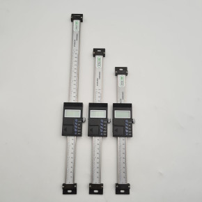 Digital ruler with vertical displacement sensor